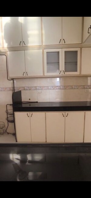 Kitchen in 3 BHK Apartment at K Raheja Palm Court, Malad West – for Rent