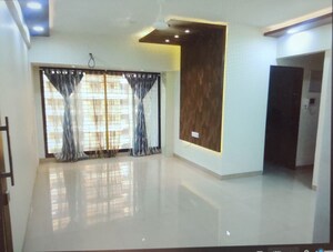 Living Room in 2 BHK Apartment at Tharwani Rosa Bella, Kharghar – for Rent