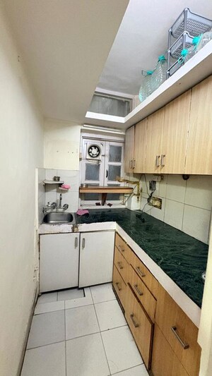 Kitchen in 2 BHK Builder Floor at Panchsheel Enclave – for Rent