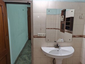 Bathroom in 2 BHK Apartment at Arun Vihar, Sector 29 – for Rent