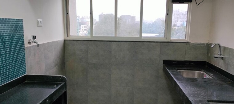 Kitchen/pantry, newton-homes-tathawade 3 Bedroom 976 Sq.Ft. Apartment In Tathawade Pune 10324186