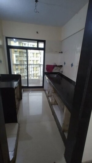 Kitchen in 2 BHK Apartment at Status Vihar, Kharghar – for Rent