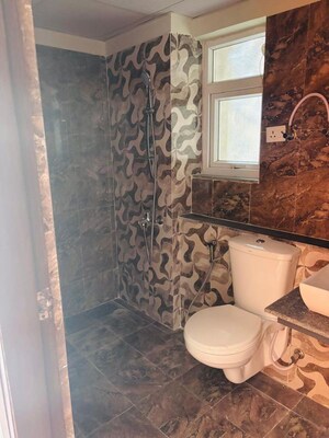 Bathroom in 3 BHK Apartment at Shri Radha Sky Gardens, Sector 16b Greater Noida – for Rent