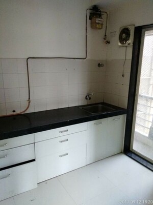 Kitchen in 2 BHK Apartment at Swastik Residency 1, Ghodbunder Road – for Rent