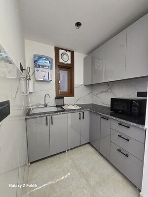 Kitchen in 2 BHK Builder Floor at Chattarpur – for Rent