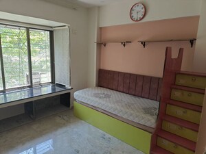 Bedroom in 2 BHK Apartment at Swastik Regalia, Waghbil – for Rent