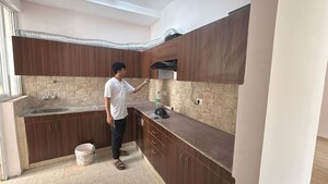 Kitchen in 3 BHK Apartment at Amrapali Golf Homes, Sector 4 Greater Noida – for Sale