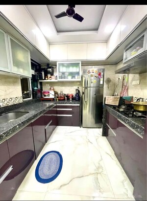 Kitchen in 3 BHK Apartment at Rosa Bella, Ghodbunder Road – for Rent