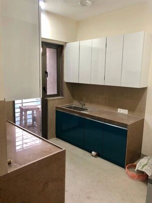 Kitchen in 2.5 BHK Apartment at Bhimjyani Verraton, Manpada – for Sale