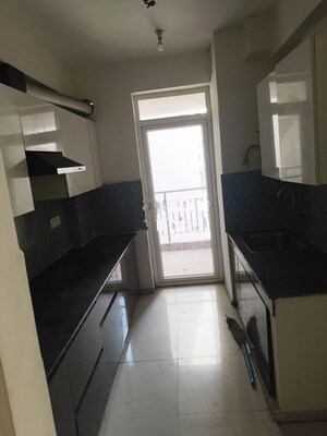 Kitchen in 3.5 BHK Apartment at Pareena Express Heights, Sector 99 – for Rent