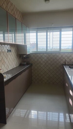 Kitchen in 3 BHK Apartment at Laxman Nagar – for Sale