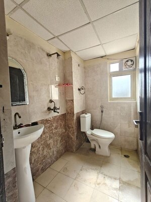 Bathroom in 3 BHK Apartment at Aims Golf City, Sector 75 – for Rent