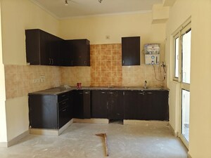 Kitchen in 3 BHK Apartment at Aims Golf City, Sector 75 – for Rent