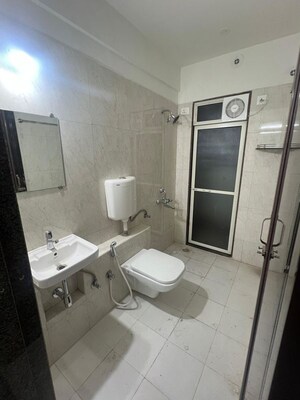 Bathroom in 2 BHK Apartment at Puranik Tokyo Bay Phase 2A, Kasarvadavali – for Rent