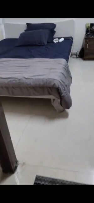 Bedroom in 1 BHK Apartment at Ruparel Elara, Kandivali West – for Rent