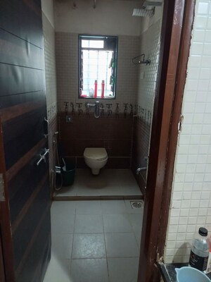 Bathroom in 2.5 BHK Apartment at Dahanukar Colony – for Rent