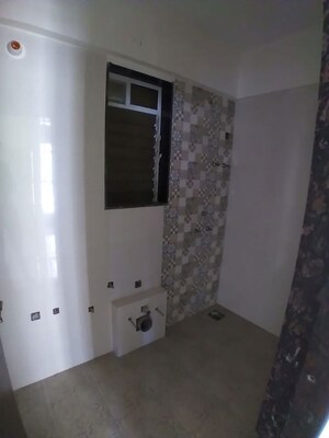 Bathroom in 2 BHK Apartment at Dharti Presidio, Malad West – for Rent