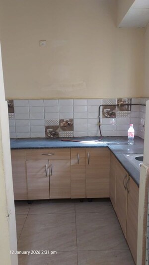 Kitchen in 2 BHK Apartment at Gaur City 2 - 14th Avenue, Sector 16c Greater Noida – for Rent