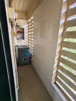 Laundry Area in 2 BHK Apartment at Lalani Residency, Kavesar – for Rent