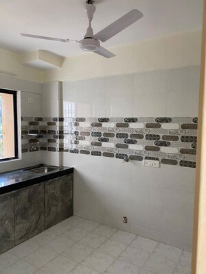 Kitchen in 1 BHK Apartment at Dharti Presidio, Malad West – for Sale