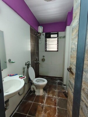 Bathroom in 2 BHK Apartment at Lalani Residency, Kavesar – for Rent