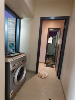 Laundry Area in 2 BHK Apartment at Lalani Residency, Kavesar – for Rent