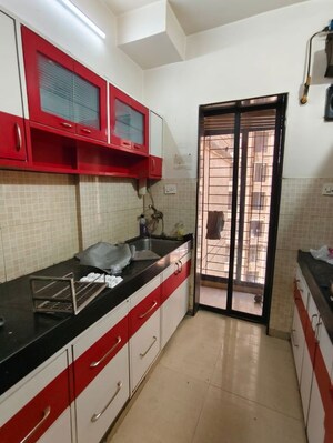 Kitchen in 2 BHK Apartment at Lalani Residency, Kavesar – for Rent