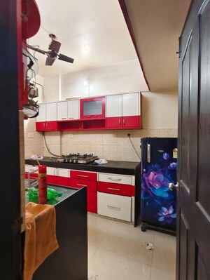Kitchen in 2 BHK Apartment at Lalani Residency, Kavesar – for Rent