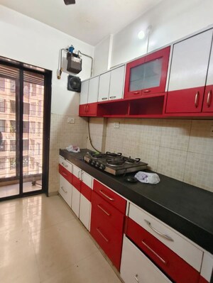 Kitchen in 2 BHK Apartment at Lalani Residency, Kavesar – for Rent