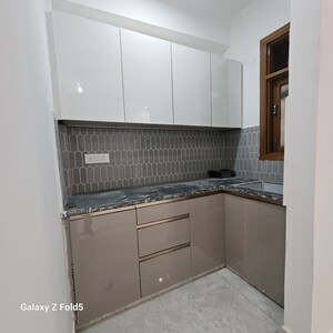 Kitchen in 1.5 BHK Builder Floor at Freedom Fighters Enclave – for Rent