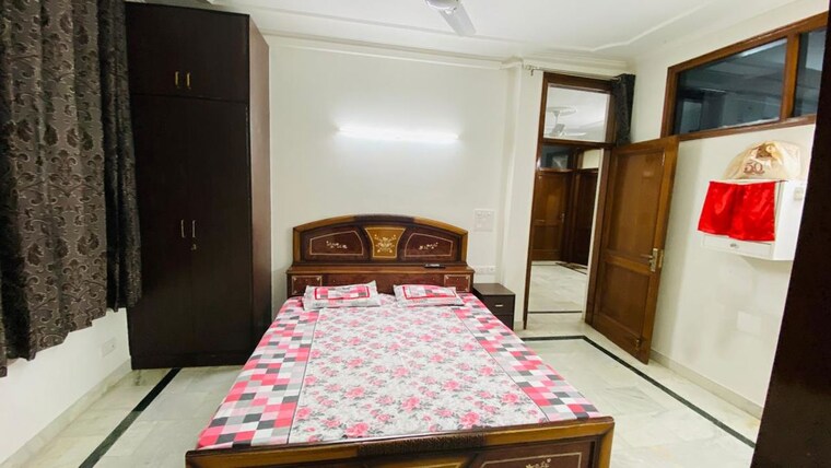 Bedroom, east of kailash 2 Bedroom 100 Sq.Yd. Builder Floor In East Of Kailash Delhi 10325064