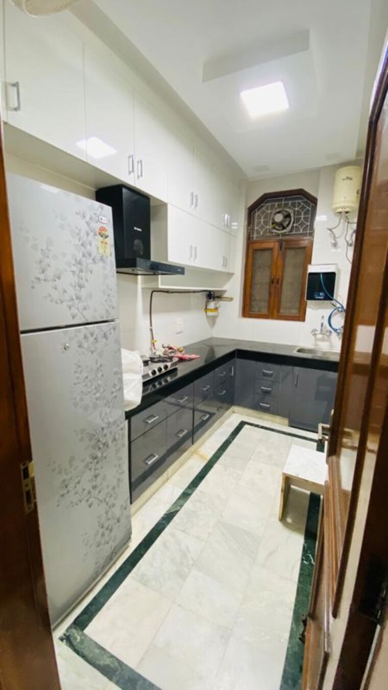 Kitchen, east of kailash 2 Bedroom 100 Sq.Yd. Builder Floor In East Of Kailash Delhi 10325064