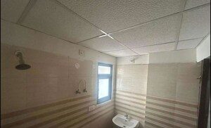 Bathroom in 3 BHK Apartment at NK Sharma Savitry Greens 2, Ghazipur – for Rent