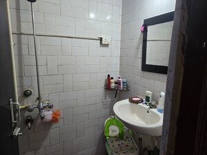 Bathroom in 2 BHK Apartment at Garden View Andheri West, Andheri West – for Rent