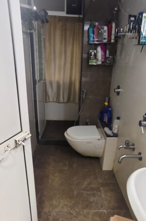 Bathroom in 2 BHK Apartment at Purnima CHS Naupada, Naupada – for Sale