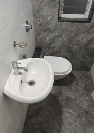 Bathroom in 2 BHK Apartment at Purnima CHS Naupada, Naupada – for Sale