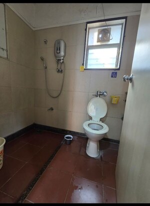Bathroom in 3 BHK Apartment at Kamal Apartment Teen Hath Naka, Louis Wadi – for Rent