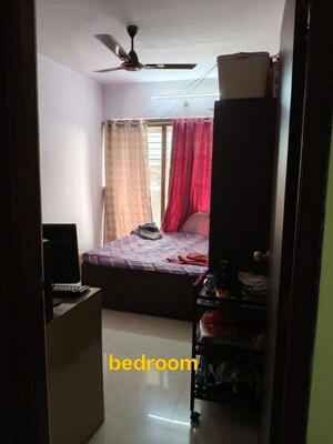 Bedroom in 2 BHK Apartment at Ganesh Krupa Society, New Panvel – for Sale
