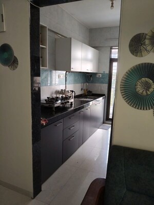 Kitchen in 2 BHK Apartment at Ganesh Krupa Society, New Panvel – for Sale