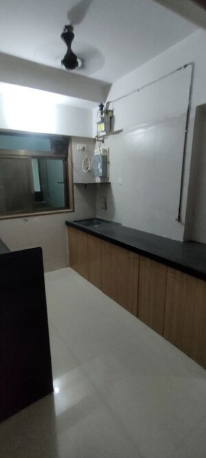 Kitchen in 2 BHK Apartment at Praful CHS, Kandivali West – for Rent
