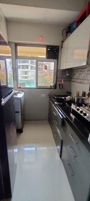 Kitchen in 2 BHK Apartment at Praful CHS, Kandivali West – for Rent