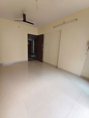 Living Room in 1 BHK Apartment at Asha Ashok Smruti, Vadavali – for Rent