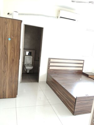 Master Bedroom in 2 BHK Apartment at Ruparel Sky Green, Kandivali West – for Rent