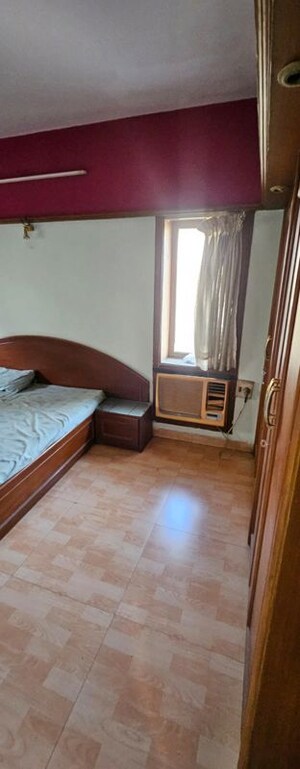Bedroom in 1 BHK Apartment at Shreeji Tower CHS, Uthalsar – for Rent
