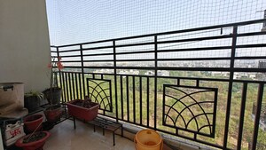 Balcony in 3 BHK Apartment at Amrapali Crystal Homes, Sector 76 – for Rent
