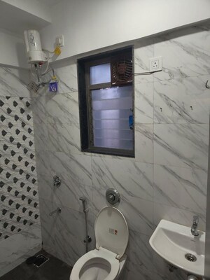 Bathroom in 1 BHK Apartment at UK Iridium, Kandivali East – for Rent