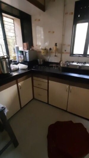Kitchen in 1 BHK Apartment at Padmavati Complex, Kandivali West – for Rent