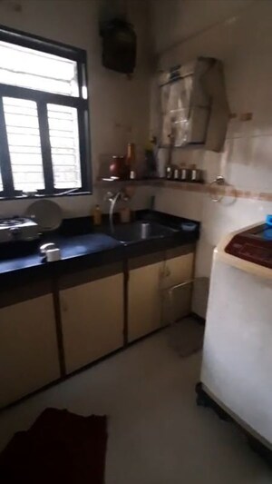 Kitchen in 1 BHK Apartment at Padmavati Complex, Kandivali West – for Rent