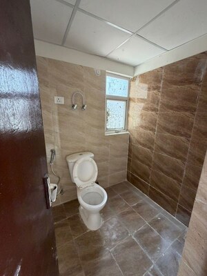 Bathroom in 3 BHK Apartment at Mahagun My Woods, Sector 16c Greater Noida – for Rent