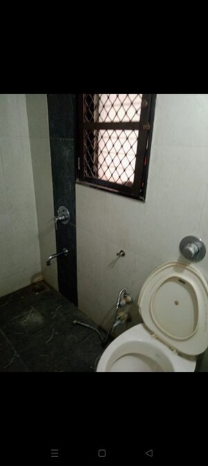 Bathroom in 2 BHK Apartment at Shree Satya Shankar Residency, Manpada – for Rent